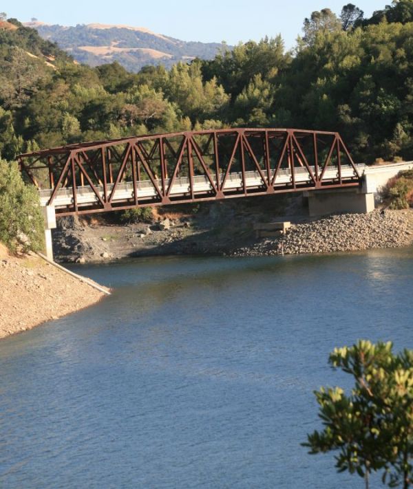 A bridge above the junction of Coyote Creek and Anderson Reservoir above Morgan Hill.
